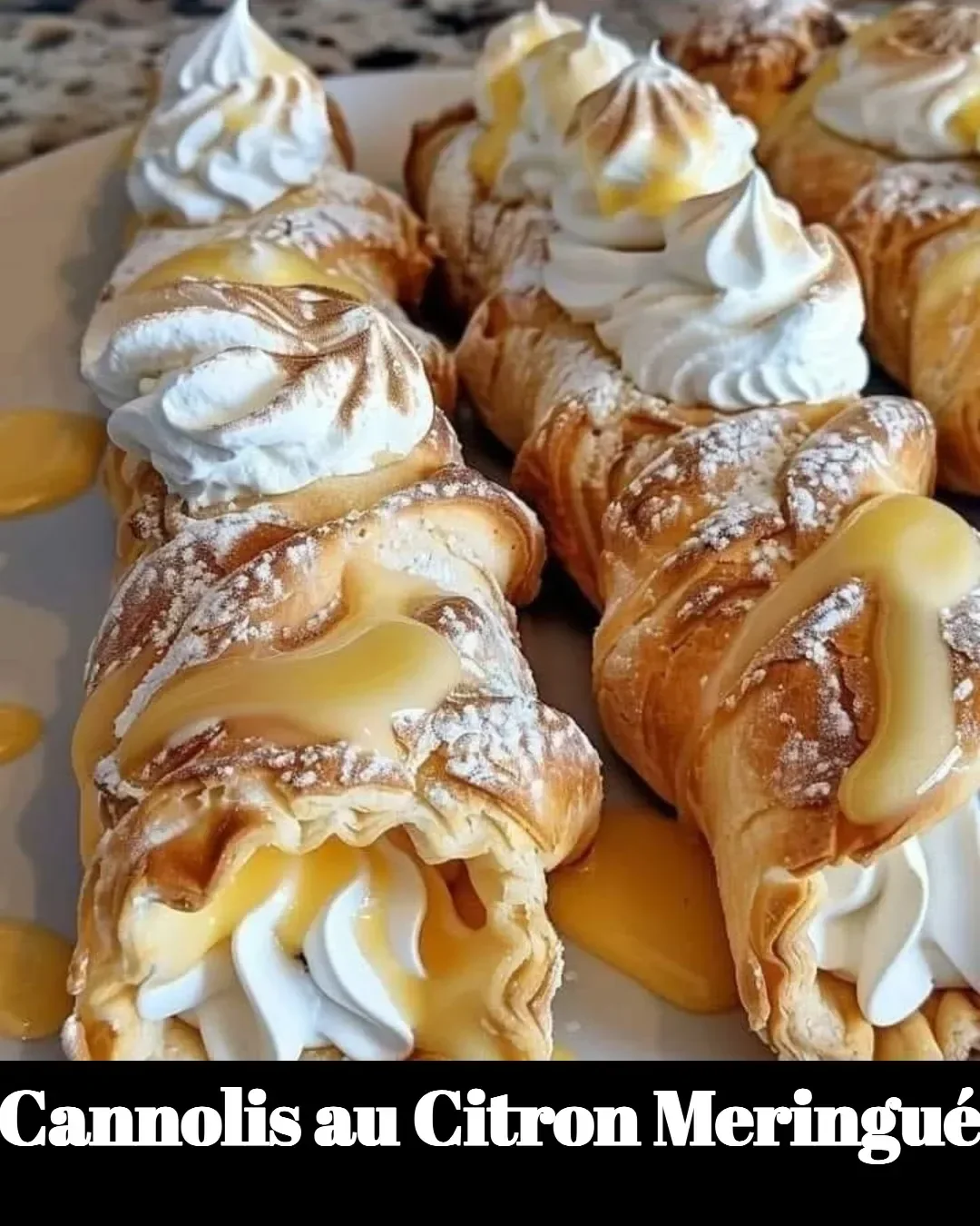 Cannolis au citron meringué garnis de crème délicate et de zestes de citron.