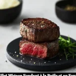 Filet mignon fondant cuit à la poêle et au four, prêt à déguster.